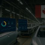 automotive plant floor with a canadian flag in the background